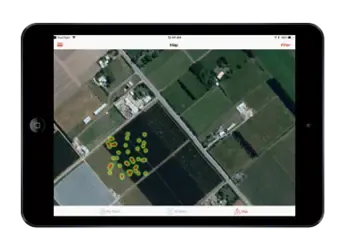 A tablet that shows a Hectre heat map with a birds eye view of an orchard.